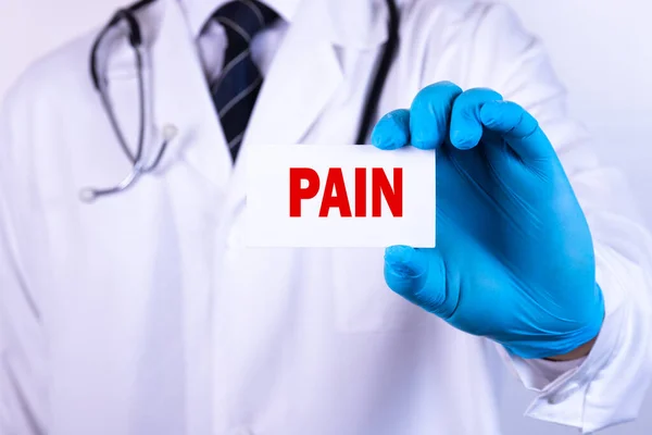 Doctor Holding Card Text Pain Medical Concept — Stock Photo, Image