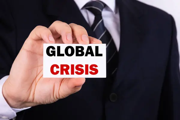 Hombre Negocios Sostiene Una Tablilla Con Texto Crisis Global Delante —  Fotos de Stock