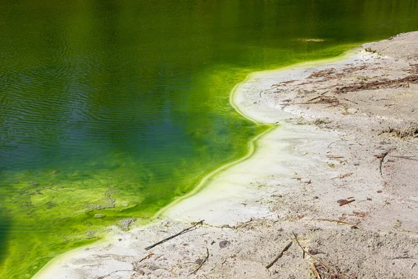 Acid lake, water, drain of chemically polluted waters. Concept business and ecology