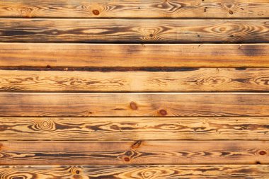 Tahta doğal, desenli, yanmış tahtalar yan yana dizilmiş, arka plan. Metin için yer.