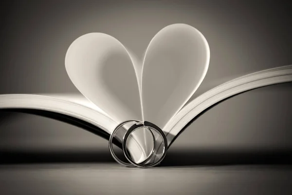 Wedding rings with love book