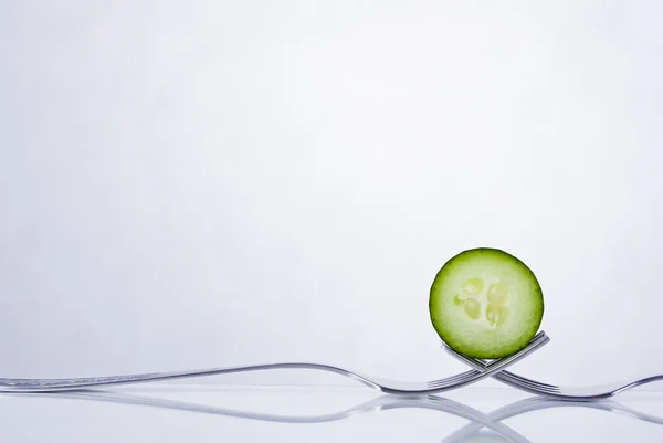 Groene komkommer samenstelling — Stockfoto
