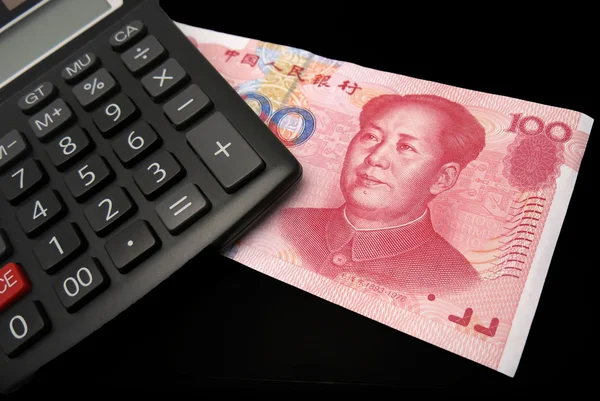 Renminbi e calculadora — Fotografia de Stock