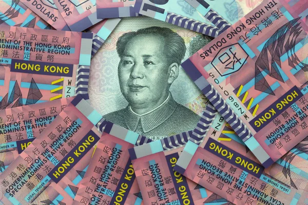 Hong Kong dollar postavena vedle sebe proti čínský jüan — Stock fotografie