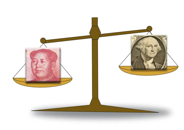 Renminbi and US dollar on a scale — ストック写真