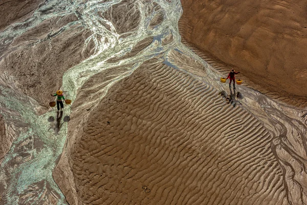 De Fisherman's in het kustgebied geplaatst dat intertidal — Stockfoto