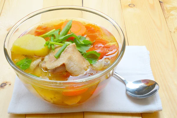 Chicken soup chicken soup with vegetables in a bowl