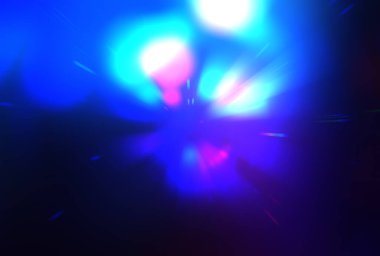 Parlak, canlı ve renkli duvar kağıtları. Parlayan parçacıkları ve çizgileri olan ışık patlaması yıldızı. Güzel soyut ışın arkaplanı.