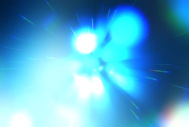 Parlak, canlı ve renkli duvar kağıtları. Parlayan parçacıkları ve çizgileri olan ışık patlaması yıldızı. Güzel soyut ışın arkaplanı.