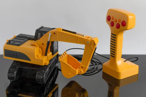 Children's plastic excavator — Stock Photo, Image