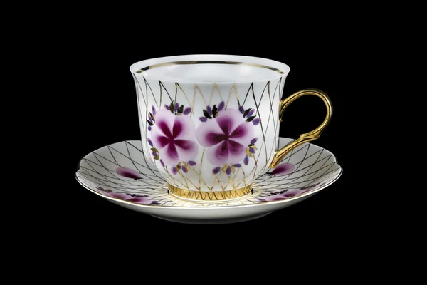 Plato y taza de té de porcelana — Foto de Stock