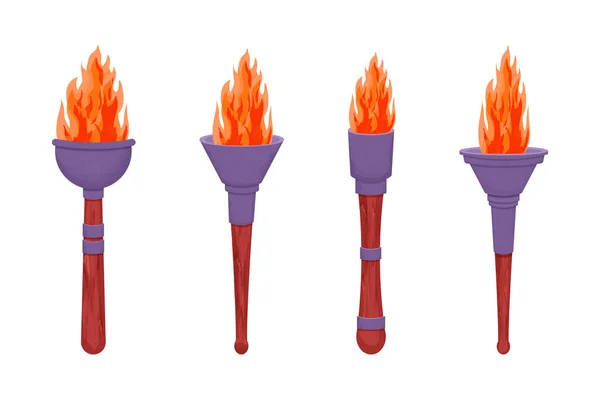 Set torche médiévale avec flamme dans le style dessin animé isolé sur fond blanc. Lampe antique, symbole du treuil. ui actif du jeu. — Image vectorielle