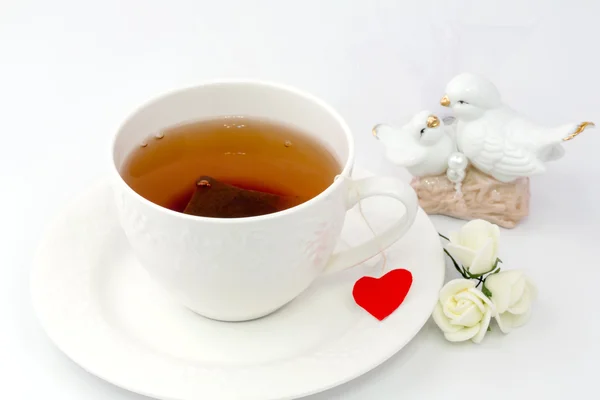 Coração de chá em um fundo branco eco orgânico relaxamento vida saudável — Fotografia de Stock