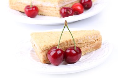 cheesecake with a cherry on a white background sweet dessert