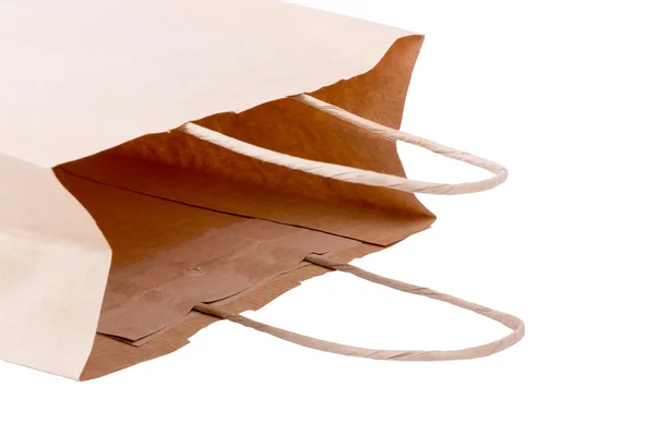 Dergisi kağıt alışveriş beyaz bir arka plan üzerinde izole çantası