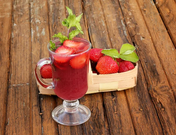 Home strawberry lemonade nonalcoholic drink mint old wooden background — Stock Photo, Image