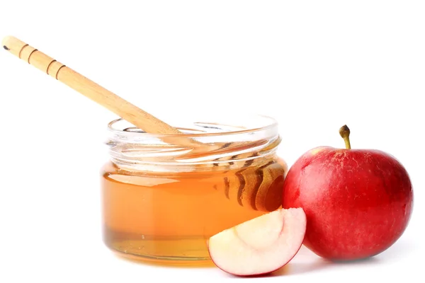 Manzana con miel aislada sobre un fondo blanco — Foto de Stock