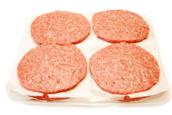 Hamburgo Patties pronto para ser cozido em um churrasco de verão — Fotografia de Stock