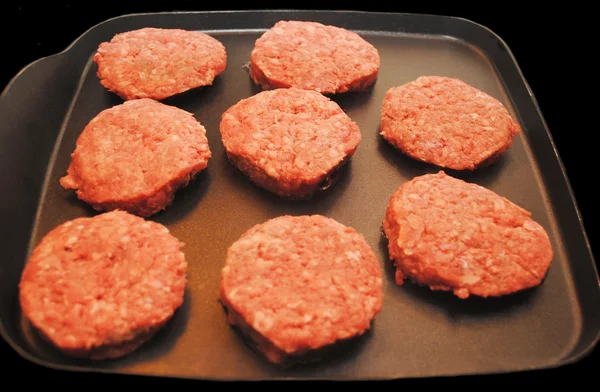 Schieber Hamburger Kochen auf einer Bratpfanne — Stockfoto