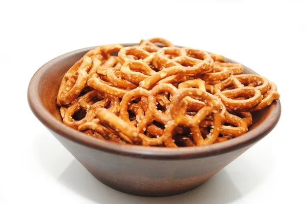 A Brown Wooden Bowl filled with Delicious Pretzels — Stock Photo, Image