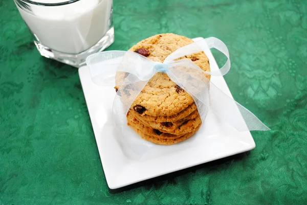 Chocolate Chips Cookies with a Bow and Milk — Stock Photo, Image