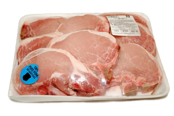 Abgepackte Schweinekoteletts mit Knochen — Stockfoto