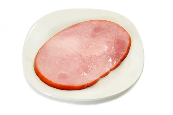 Filete de jamón magro en una placa blanca — Foto de Stock