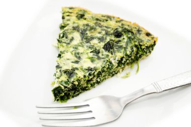 Yemek ıspanak Quiche bir çatal ile hizmet