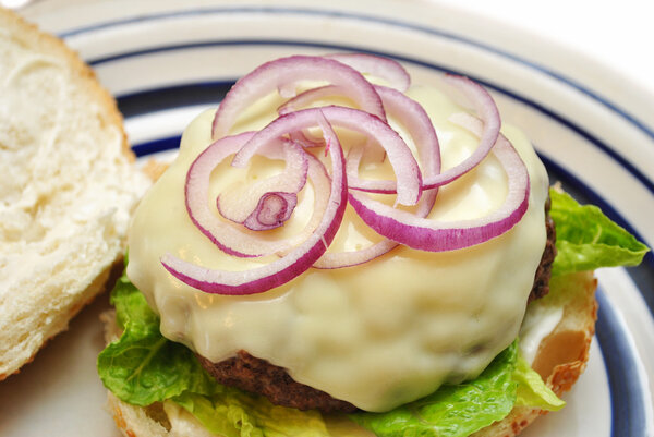 Juicy Cheese Burger with Sliced Red Onion