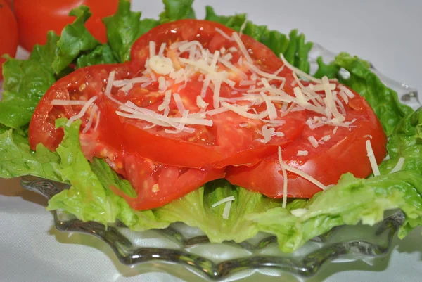 Sliced Tomato with Shredded Cheese — Stock Photo, Image