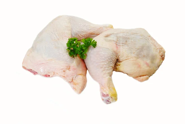 Perejil fresco en la parte superior de dos cuartas patas de pollo orgánico —  Fotos de Stock