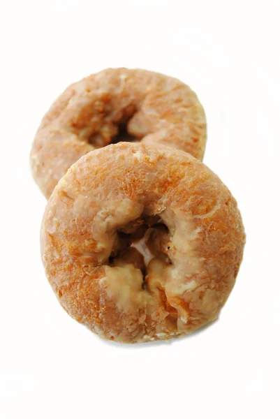 Två kryddig honungsglaserad pumpa Donuts på vit — Stockfoto