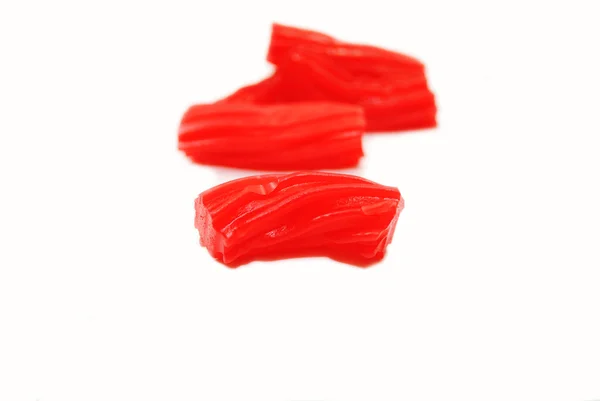 Red Licorice Pieces Isolated on White — Stock Photo, Image