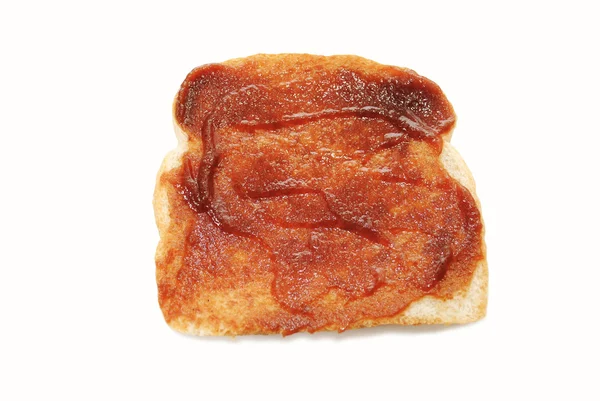 Кусочек тоста с яблочным маслом. — стоковое фото