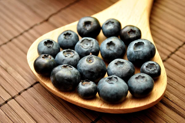 Blueberries on a Wooden Spoon — Stockfoto