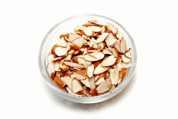 Shaved Almonds in a Clear Glass Bowl — Stock Photo, Image