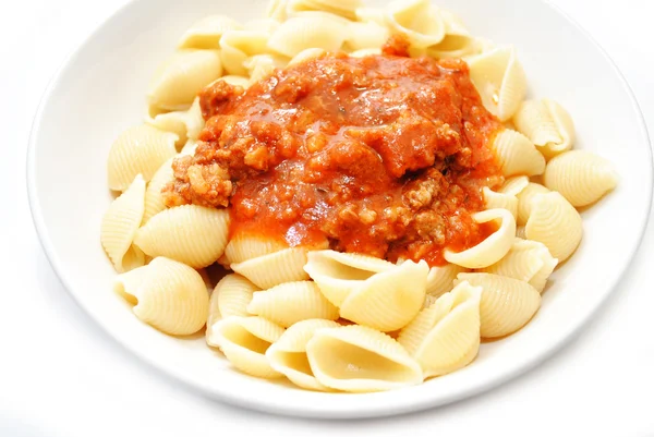 Tomato Bolognese Sauce on Cooked Pasta Shells — Stock Photo, Image