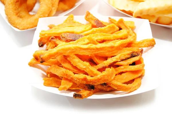 A Take Out Container Filled with Sweet Potatoes — Stock Photo, Image