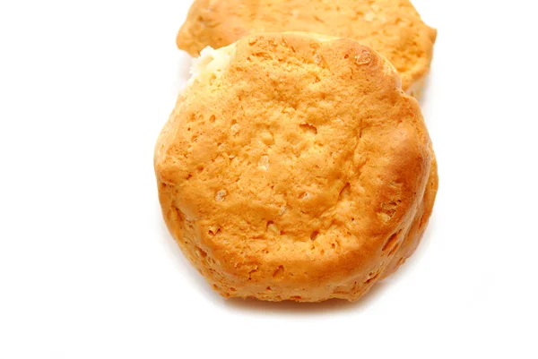 Close Up of a Baked Biscuit Over White — Stock Photo, Image