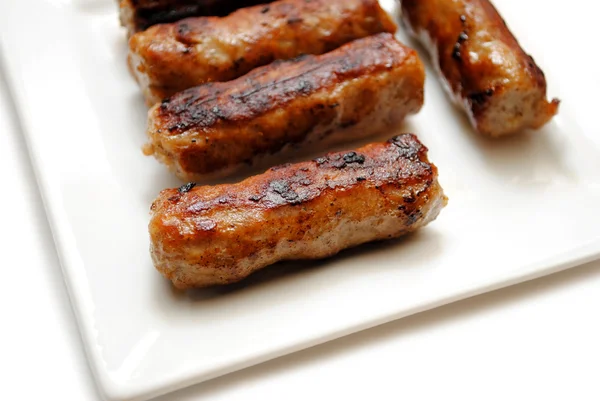 Fried Breakfast Link Sausage on a White Plate — Stock Photo, Image