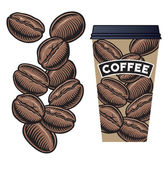 Kávová zrna a šálek kávy s víkem