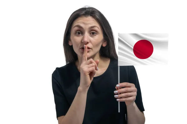 Feliz Joven Mujer Blanca Sosteniendo Bandera Japón Sostiene Dedo Sus —  Fotos de Stock