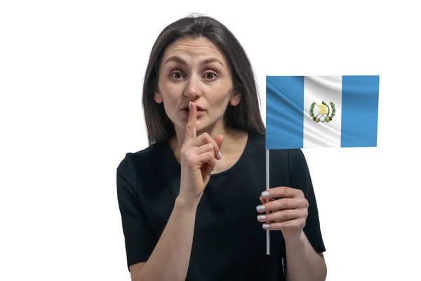 Happy Young White Woman Holding Flag Guatemala Holds Finger Her — Zdjęcie stockowe