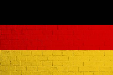 Almanya bayrağı. Almanya bayrağının tuğla duvar dokusu.