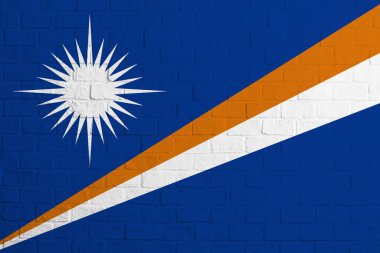 Marshall Adaları bayrağı. Marshall Adaları bayrağının tuğla duvar dokusu.