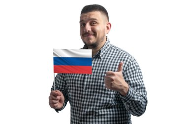 Beyaz adam elinde Rusya 'nın bayrağını tutuyor ve sınıfın beyaz bir arka planda tek başına olduğunu gösteriyor. Rusya için olduğu gibi.