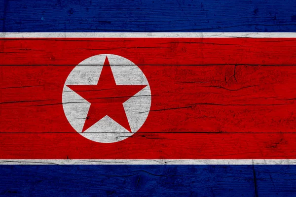 Flag of North Korea Wooden texture of the flag of North Korea.