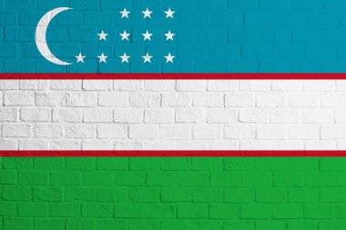 Özbekistan bayrağı. Özbekistan bayrağının tuğla duvar dokusu.