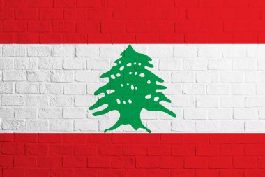 Lübnan bayrağı. Lübnan bayrağının tuğla duvar dokusu.