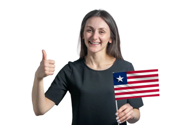 Jovem Mulher Branca Feliz Segurando Bandeira Libéria Mostra Classe Mão — Fotografia de Stock